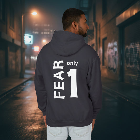 A man shown from the back wearing a dark gray hoodie with bold white text on the back reading 'FEAR only 1', paired with light gray jeans, against a plain white background.